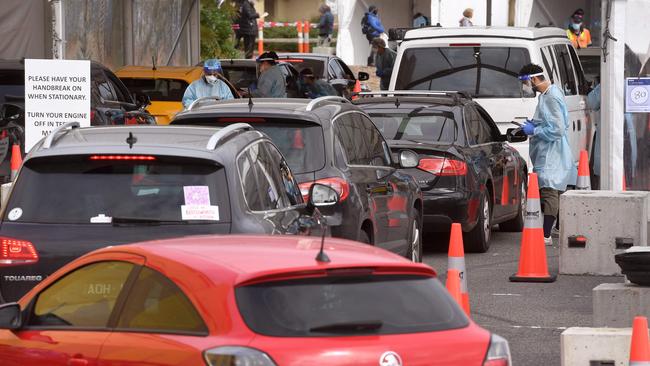 People queue for Covid-19 coronavirus tests in the Melbourne suburb of St Kilda. Picture: AFP