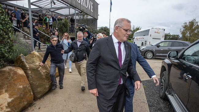 Trevor Sofield, the former Solomons Island High Commissioner, is held back by the PM’s security. Picture: Jason Edwards