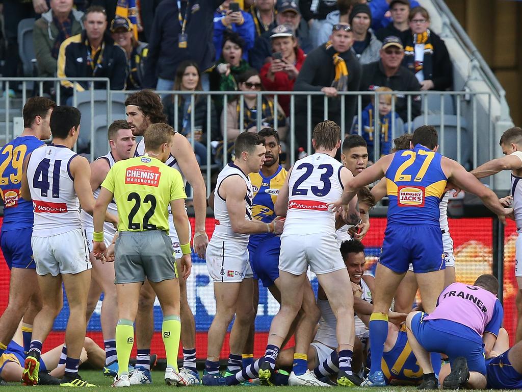 Tempers ran high through the match, with scuffles breaking out between the playing groups across the game. Picture: Paul Kane/Getty Images