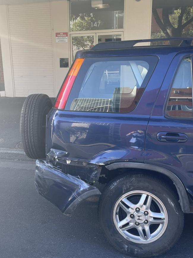 The car hit by the man in the allegedly stolen taxi. Picture: Ashley Wick/9 News