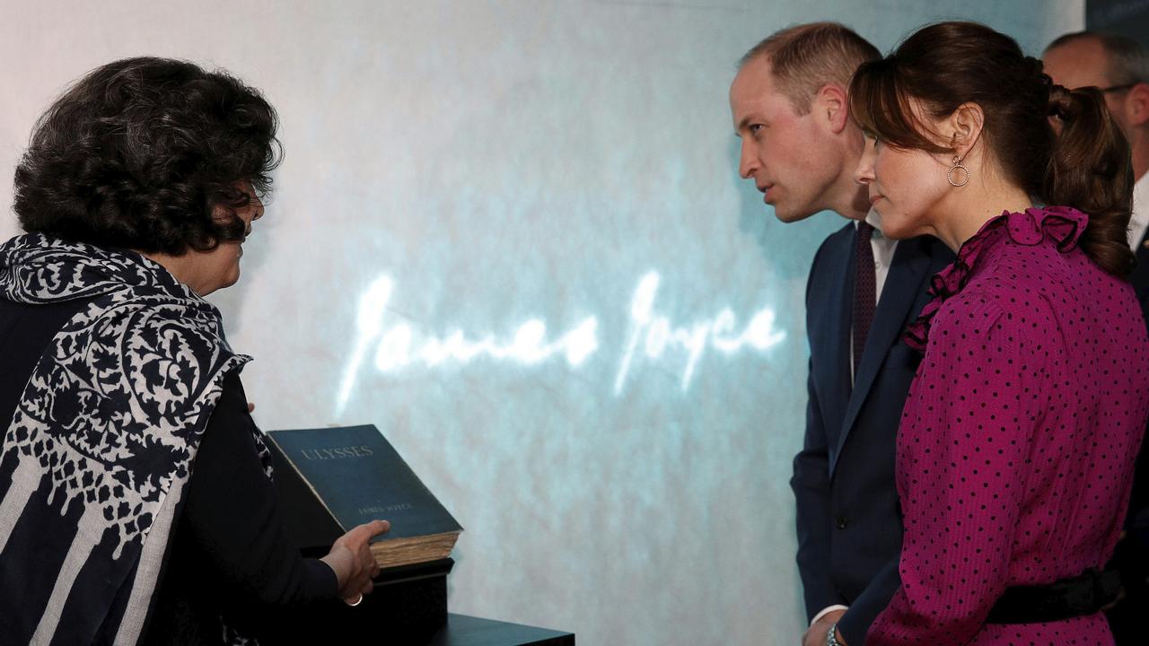 A first edition copy of James Joyce's novel Ulysses is shown to William and Kate. Picture: AP