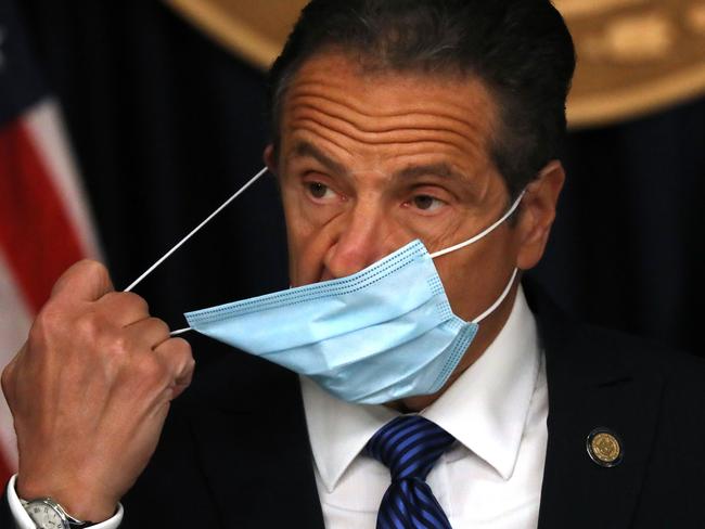 NEW YORK, NEW YORK - MAY 21: New York Governor Andrew Cuomo arrives with a face mask at a news conference on May 21, 2020 in New York City. While the governor continued to say that New York City is seeing a steady decline in coronavirus cases, he also mentioned that the number of countries reporting a mysterious illness in children believed to be connected to COVID-19 has nearly doubled in just one week.   Spencer Platt/Getty Images/AFP == FOR NEWSPAPERS, INTERNET, TELCOS & TELEVISION USE ONLY ==