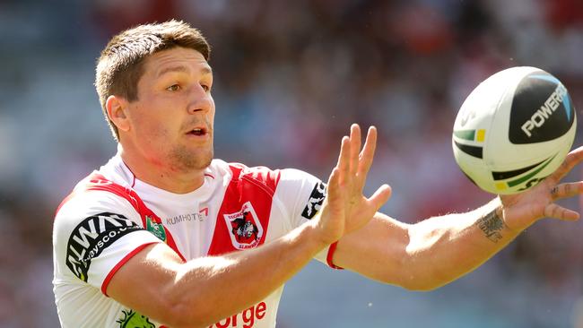 Dragons star Gareth Widdop takes a pass.