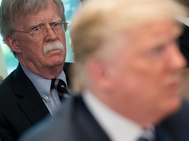 National Security Adviser John Bolton watches US President Donald Trump. Picture: AFP