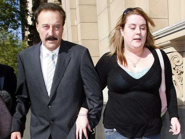 Ronald William Crawford and his daughter leave the Supreme Court in 2006. Picture: AAP