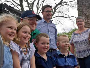 LITTLE FANS: Scott Morrison and some of his tiniest fans in Dalby. Picture: Meg Gannon