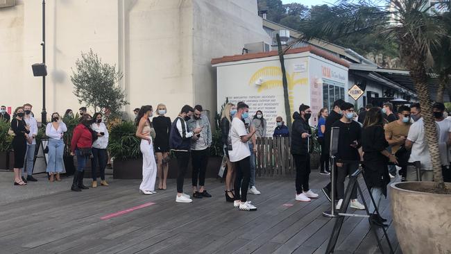 Patrons have lined up ready to spend the afternoon at Howard Smith Wharves as lockdown restrictions ease. Picture: Shiloh Payne