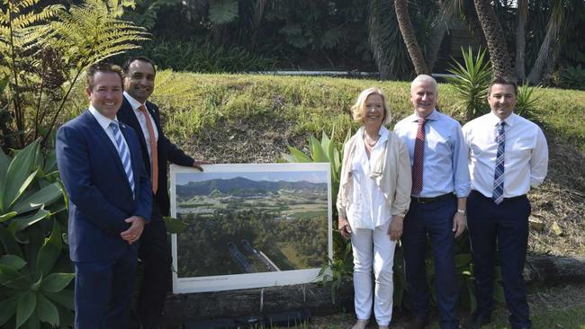 Paul Toole, Gurmesh Singh, Denise Kinight, Michael McCormack and Pat Conaghan with an image of the proposed bypass. Picture: Sam Flanagan