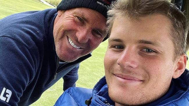 Jackson Warne and his father Shane Warne.