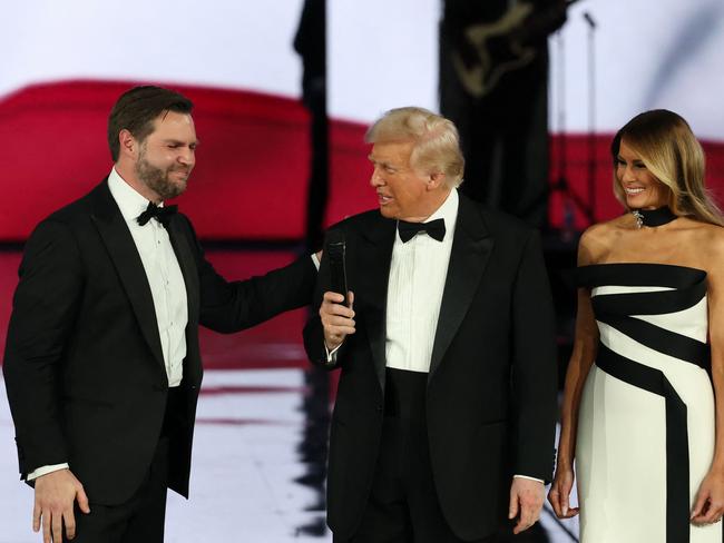 WASHINGTON, DC - JANUARY 20: VIce President JD Vance, President Donald Trump, First Lady Melania Trump, and Lara Trump on stage at the Liberty Inaugural Ball on January 20, 2025 in Washington, DC. President DonaldTrump attends some of the inaugural balls after taking the oath as the 47th president.   Joe Raedle/Getty Images/AFP (Photo by JOE RAEDLE / GETTY IMAGES NORTH AMERICA / Getty Images via AFP)