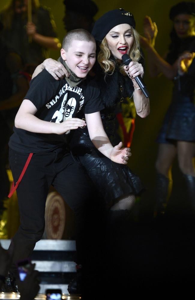 In happier times ... Rocco Ritchie and his mother Madonna perform on stage during her MDNA tour. Picture: Kevin Mazur/WireImage