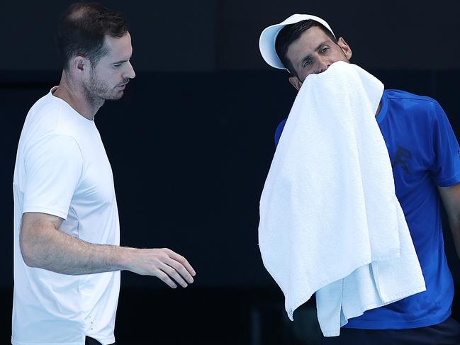 MELBOURNE, AUSTRALIA - JANUARY 09: Novak Djokovic of Serbia speaks with his coach Andy Murray during a practice session ahead of the 2025 Australian Open at Melbourne Park on January 09, 2025 in Melbourne, Australia. (Photo by Daniel Pockett/Getty Images)