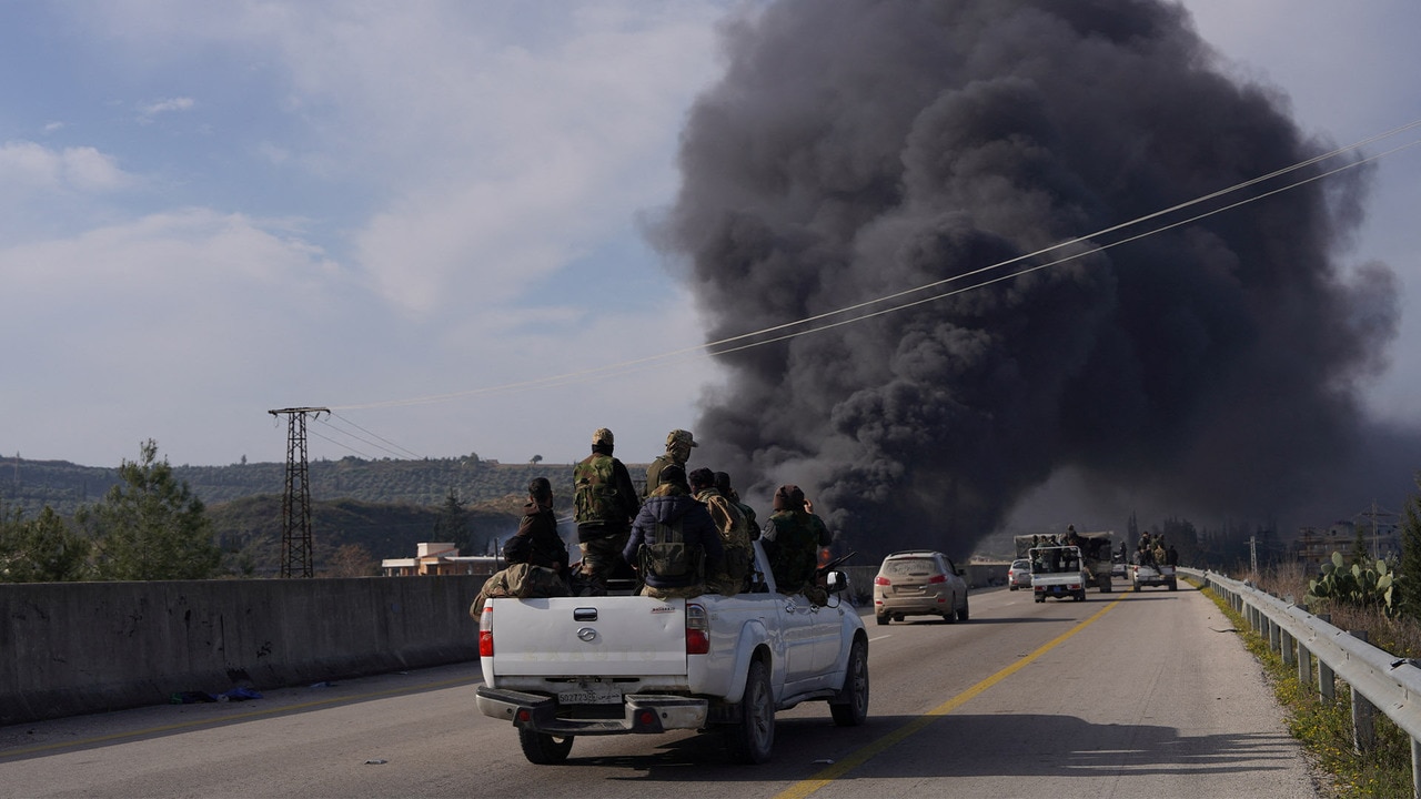 Dozens killed in Syria after Assad loyalists ambush government forces