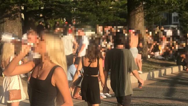 Revellers on East Esplanade, Manly, late on Saturday afternoon. There is no suggestion that anyone in this photograph is drinking illegally. Picture: Supplied