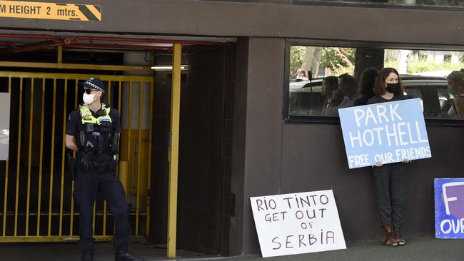 Protesters outside the Park Hotel when Novak Djokovic was being detained. Picture: Andrew Henshaw