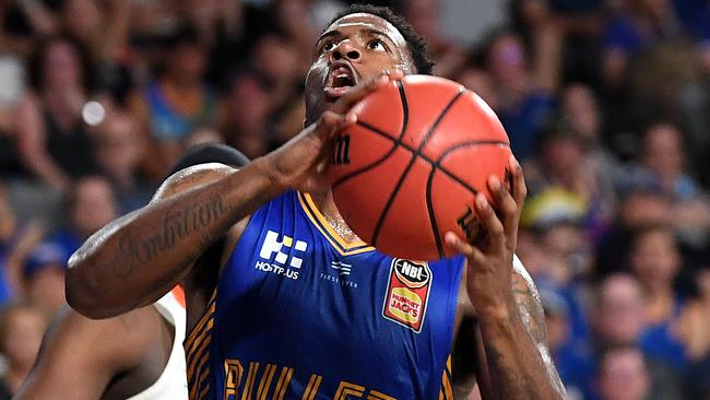 Lamar Patterson on his way to the basket against the Cairns Taipans. Picture: AAP Image/Dan Peled