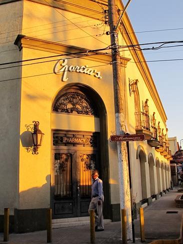 A man walks by the Garcia shopping complex, which has seen trade plummet.