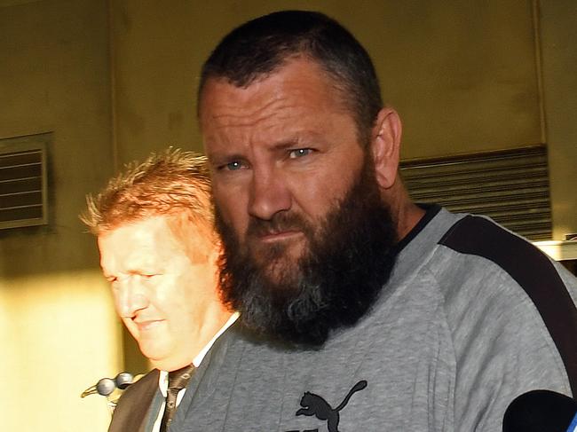 16/05/19 - Steven Hainsworth ,  suspect in the murders of Stephen Newton , Beverley Hanley and Phyllis Harrison arriving at Adelaide airport after being extradited from Melbourne.Picture: Tom Huntley