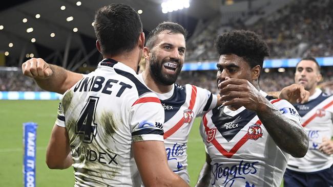 TOWNSVILLE, AUSTRALIA - APRIL 02:  Joseph Manu of the Roosters celebrates after scoring a try  during the round four NRL match between the North Queensland Cowboys and the Sydney Roosters at Qld Country Bank Stadium, on April 02, 2022, in Townsville, Australia. (Photo by Ian Hitchcock/Getty Images)