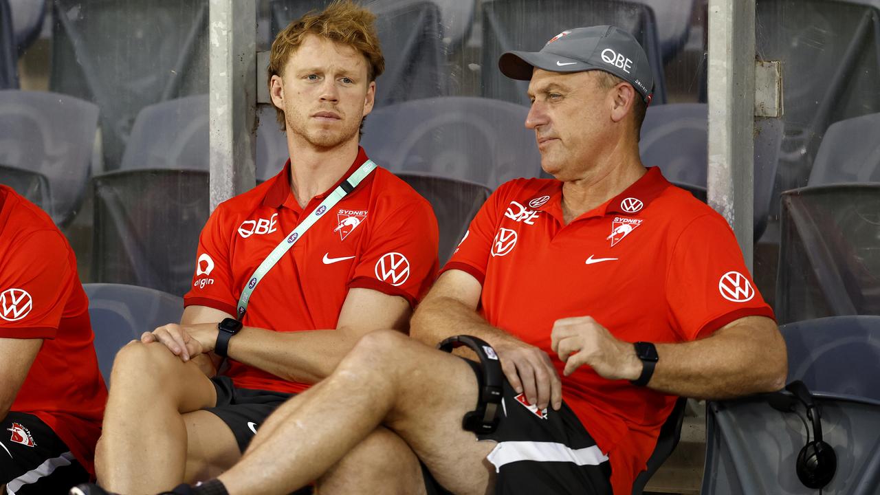 Callum Mills, who will miss the season opener, and John Longmire. Picture: Phil Hillyard