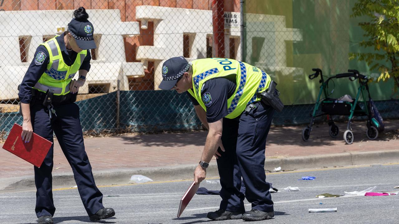 Police at the scene of Woodville Rd, Woodville South after a crash between a car and a pedestrian. Picture: NCA NewsWire / Kelly Barnes