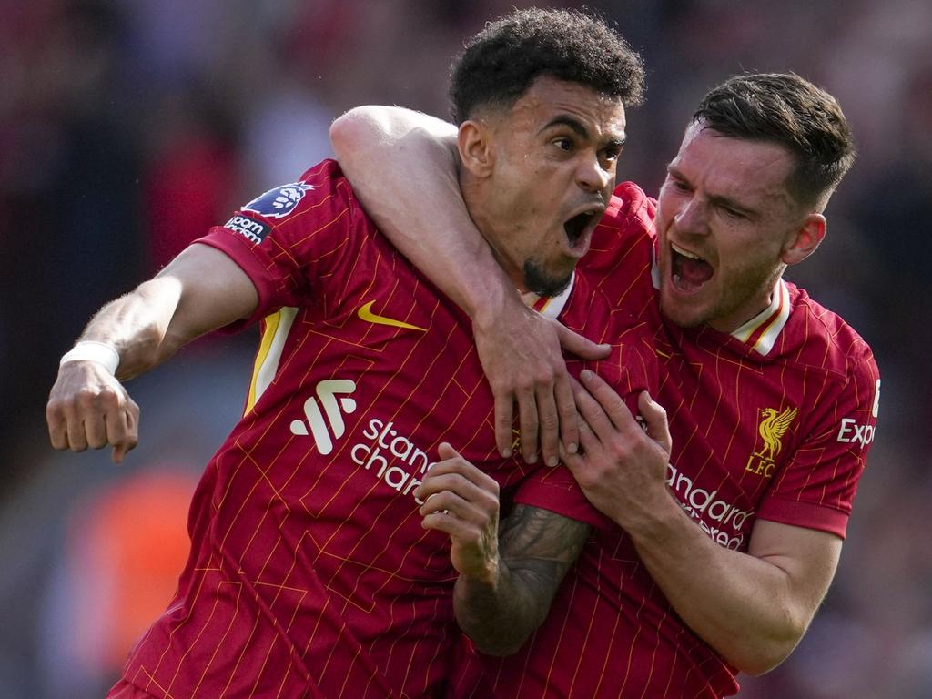 Luis Diaz abd Andrew Robertson celebrate Liverpool’s equaliser against Tottenham. Picture: AP Photo/Jon Super