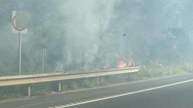 Smoke warning issued for areas around Blackwater near Ipswich as fire can be seen next to the Cunningham Highway. Photo: Ipswich Metal Recycling