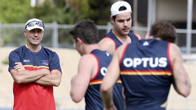 New Coach Matthew Nicks watches young Crows Darcy Fogarty, Ned McHenry and Jordan Gallucci at his first training session at the club. Picture: SARAH REED