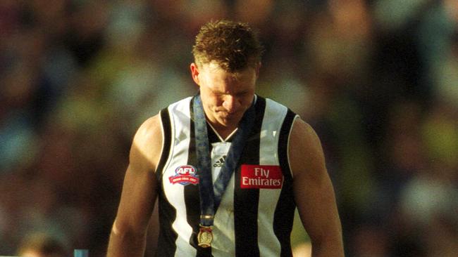 Nathan Buckley is named Norm Smith medallist after a close loss to Brisbane Lions in the 2002 Grand Final.