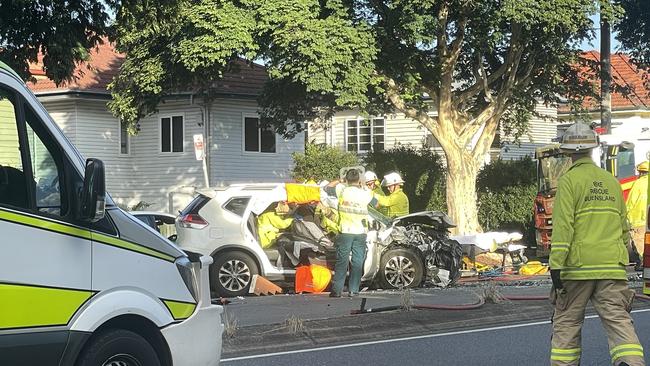 Ambulance officers at the scene. Picture: Jonathan O'Neill