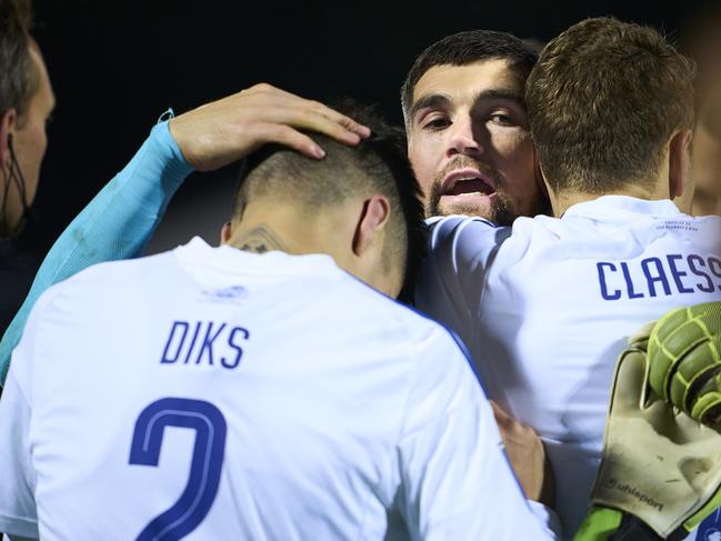 Maty Ryan of FC Copenhagen celebrates with teammates after winning a Danish Pokalen cup match against Hobro IK on penalties on Thursday morning (AEDT). Picture: Lars Ronbog/FrontZoneSport via Getty Images