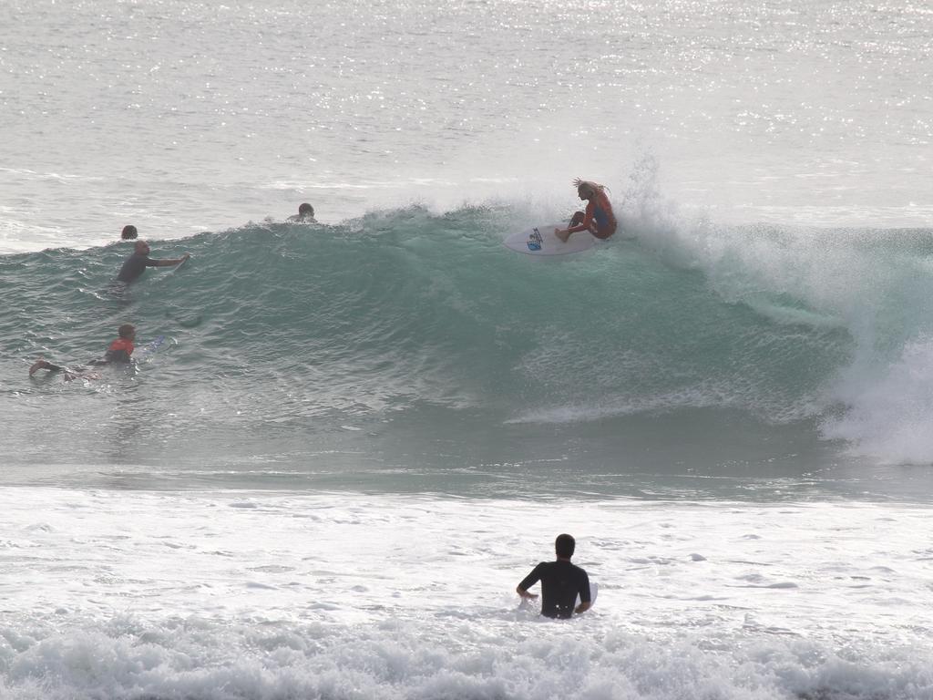 Surfers pictured enjoying good swell and near perfect waves at Snapper Rocks. Picture: Mike Batterham