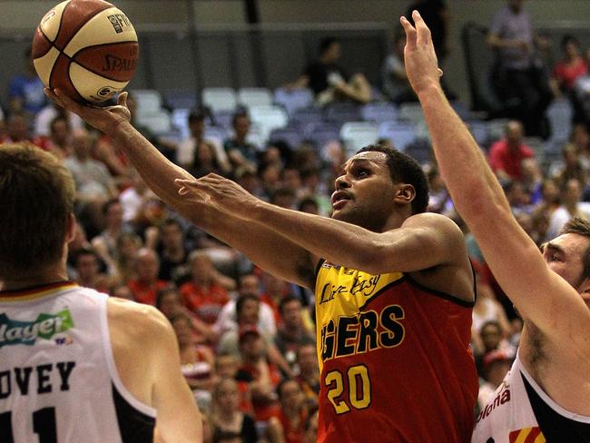 Patty Mills playing for the Tigers in 2011. Picture: Hamish Blair/Getty Images