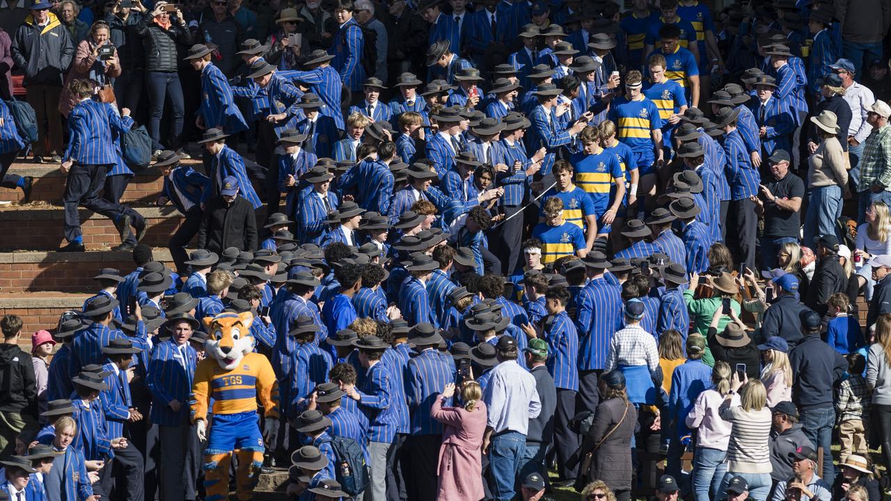 Grammar First XV walk down the steps lined with students for the O'Callaghan Cup.