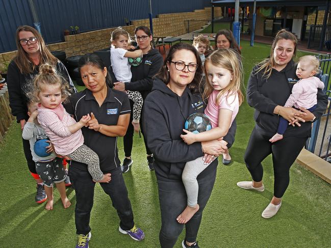 Director of Play & Learn Centre in Warrane, (front) Jackie Hughes with Gracie Jenkins, 4 and staff (rear) LR Nat McNally, Lily Winzil with Eden Jordan, 2, Teresa Swain with Sophie Swain, 4, Cheynie Byrns with Henry Tyrell, 1 and Amelia Rogers with Piper Connors, 1 as there is increasing pressure on the child care sector due to the COVID-19 crises. Picture: Zak Simmonds