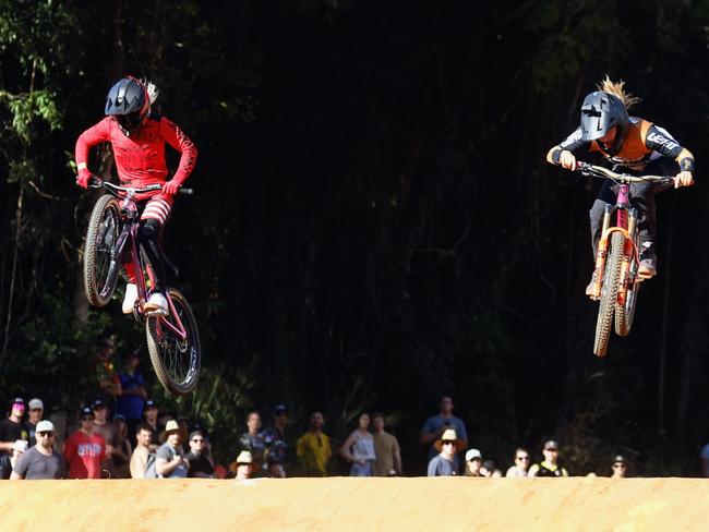 Caroline Buchanan and Jenna Hastings compete in the Speed & Style competition on Day Two of the Crankworx Cairns mountain bike festival, held at the Smithfield Mountain Bike Park. Picture: Brendan Radke