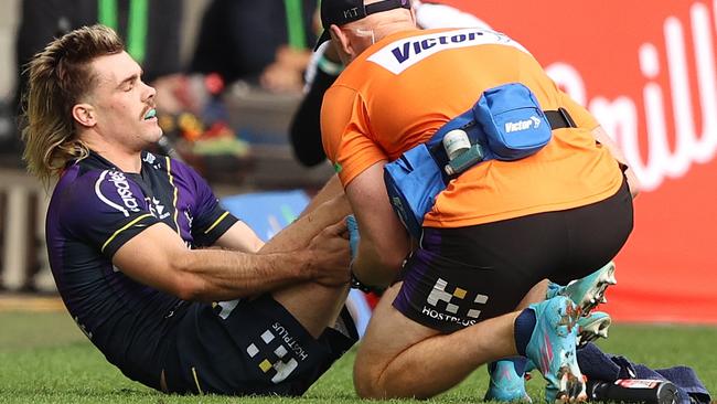 MELBOURNE, AUSTRALIA - MAY 08: Ryan Papenhuyzen of the Storm is checked for a possible injury during the round nine NRL match between the Melbourne Storm and the St George Illawarra Dragons at AAMI Park, on May 08, 2022, in Melbourne, Australia. (Photo by Robert Cianflone/Getty Images)