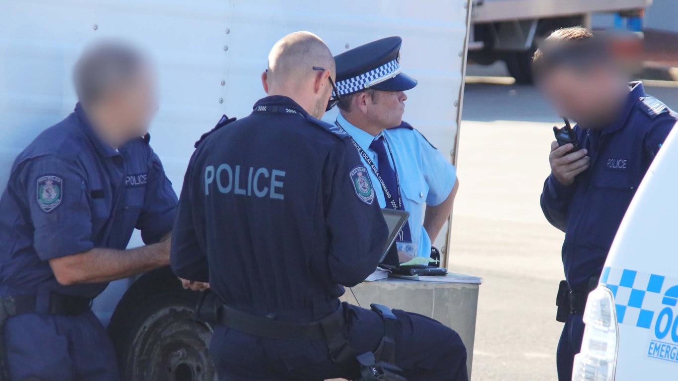 Heavily armed tactical police were involved in this morning's police operation at Sapphire Beach. Picture: Frank Redward