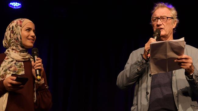 Bankstown Poetry Slam co-founder Sara Mansour performing with Bryan Brown at the Bryan Brown Theatre. Picture: Simon Bullard