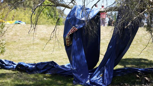 The remains of the jumping castle after it was thrown 10m into the air but a gust of wind. Picture: Rob Burnett.