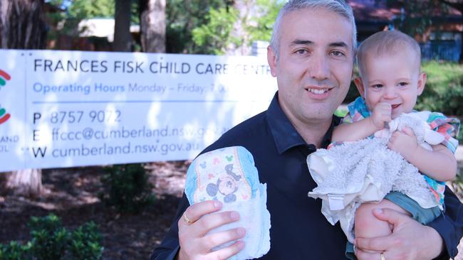 Cumberland Mayor Steve Christou with baby Hunter at Frances Fisk Childcare Centre at Granville.