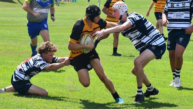 Townsville Grammar School U17 rugby team captain Ned Smith on his way to scoring a try against Townsville Brothers earlier this year. Although it ranked third, it had a higher total gross income per student of $25,180 in 2022. Picture: Cameron Bates