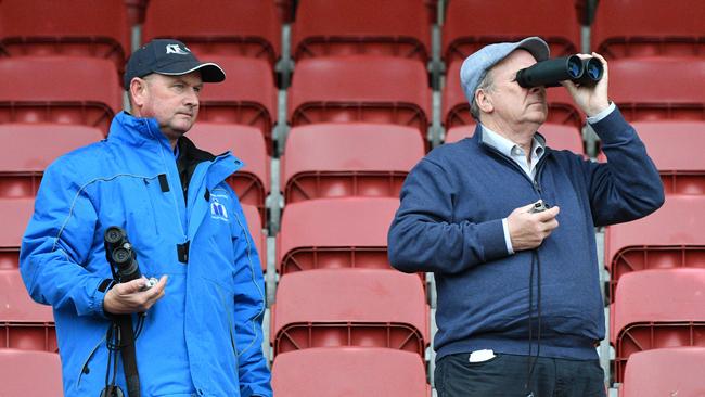 MELBOURNE, AUSTRALIA - SEPTEMBER 25: Trainer's Toby Edmonds and Robert Smerdon are seen clocking their horses during a trackwork Session at Moonee Valley Racecourse on September 25, 2017 in Melbourne, Australia. (Photo by Vince Caligiuri/Getty Images)