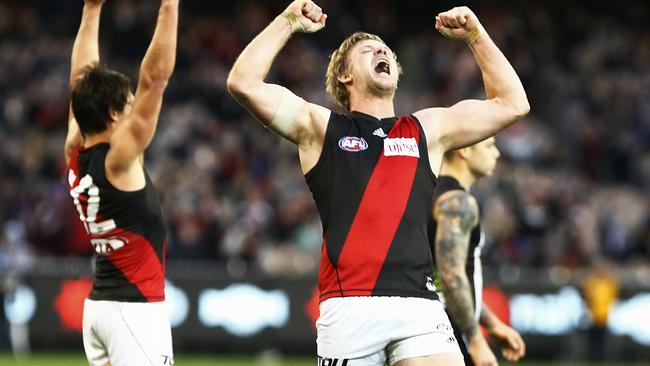 Michael Hurley celebrates an Essendon win against Collingwood. Picture: Wayne Ludbey