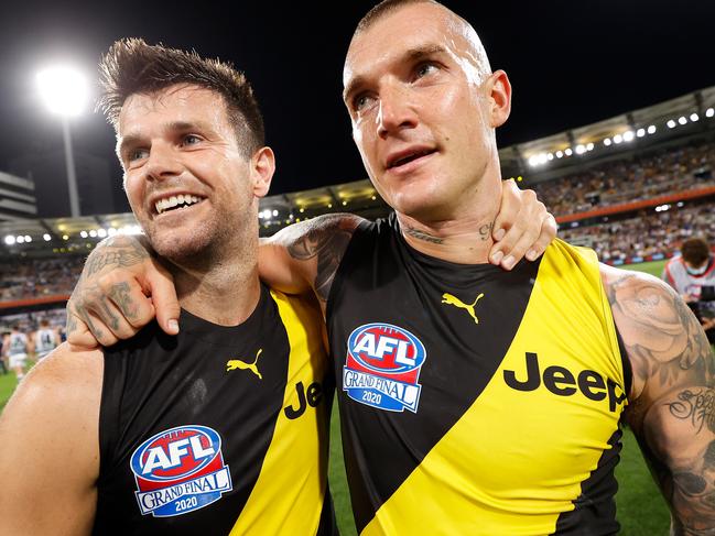 BRISBANE, AUSTRALIA - OCTOBER 24: Trent Cotchin and Dustin Martin of the Tigers (right) celebrate during the 2020 Toyota AFL Grand Final match between the Richmond Tigers and the Geelong Cats at The Gabba on October 24, 2020 in Brisbane, Australia. (Photo by Michael Willson/AFL Photos via Getty Images)