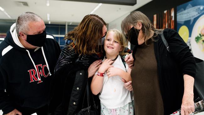 Phil Parrish, Mim Frisina, Amirah Bennett, and Pauline Parrish at arrivals in Adelaide Airport after SA announces a border closure to NT, WA, QLD and the ACT. Picture: Morgan Sette