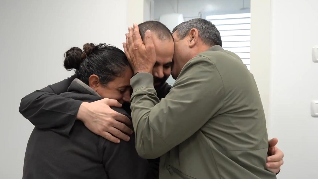 Newly-freed hostage Yarden Bibas (C) is reunited with members of his family on February 1, 2025 following his release from Palestine. But his wife wan children were not released. Picture: IDF