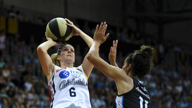 Steph Blicavs of the Adelaide Lightning in action against Kia Nurse of the Capitals. Picture: AAP Image/Lukas Coch