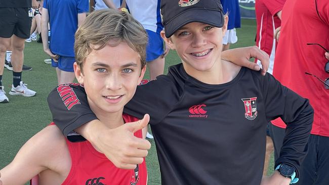 Terrace's Jerome Meili with a mate after winning.