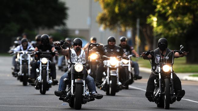 Members of the Finks motocycle gang take off on their national run from their Melbourne headquarters, Saturday, March 9, 2013. (AAP Image/Joe Castro) NO ARCHIVING, EDITORIAL USE ONLY